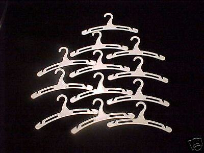 NEW DOLL HANGERS ALL WHITE